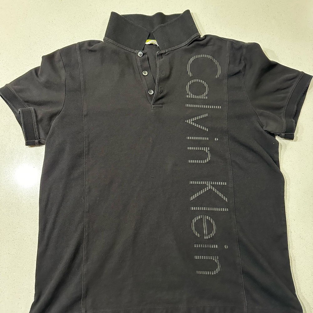 Calvin Klein Black Polo Shirt for Men size S.